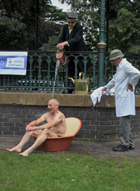 Water Cure Re-enactment, the "descending douche", with Dr John Harcup as Dr Wilson, Ken Crump as Bath Attendant and David Armitage as Patient.